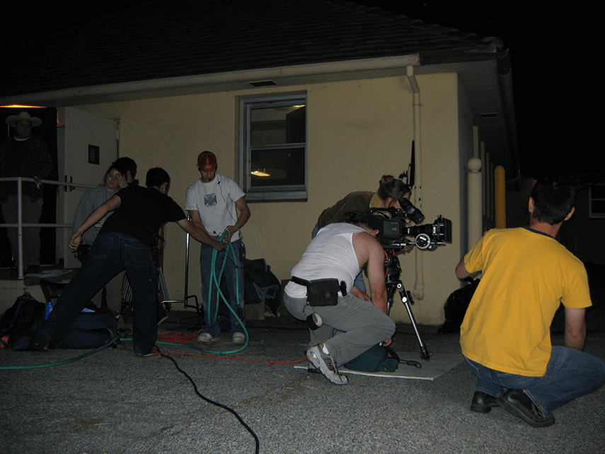 crew outside at night with camera